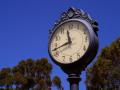 background: Clock in a park