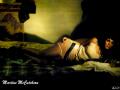 background: Martine in bed