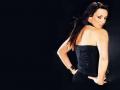 background: over shoulder pose Martine McCutcheon