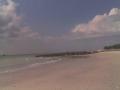 background: beautiful day at the beach in Bradenton, FL