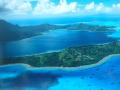 background: Island in the deep blue ocean