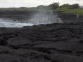 background: Black sand beach on the big iland